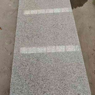 盐城芝麻白光面毛板